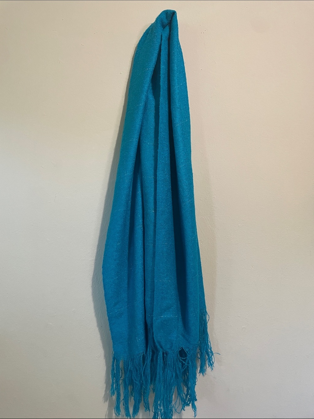 Turquoise blue with silver window pane stitching.